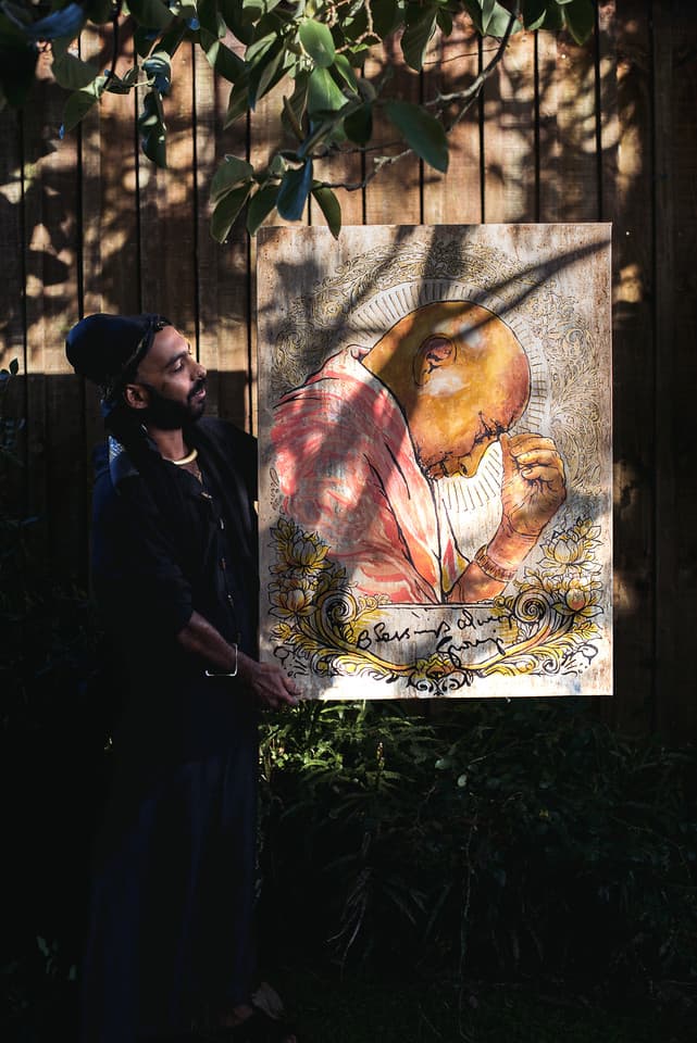 Artist with painting